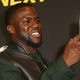 Kevin Hart takes pictures with his mobile phone during a photo call for the film Ride Along: Next Level Miami on Jan. 18, 2016, in Berlin.
Adam Berry/Getty Image